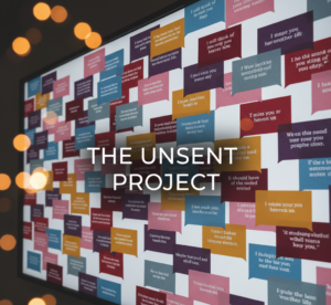 The Unsent Project archive showcasing millions of anonymous, color-coded messages to first loves with growth statistics and emotional data charts.